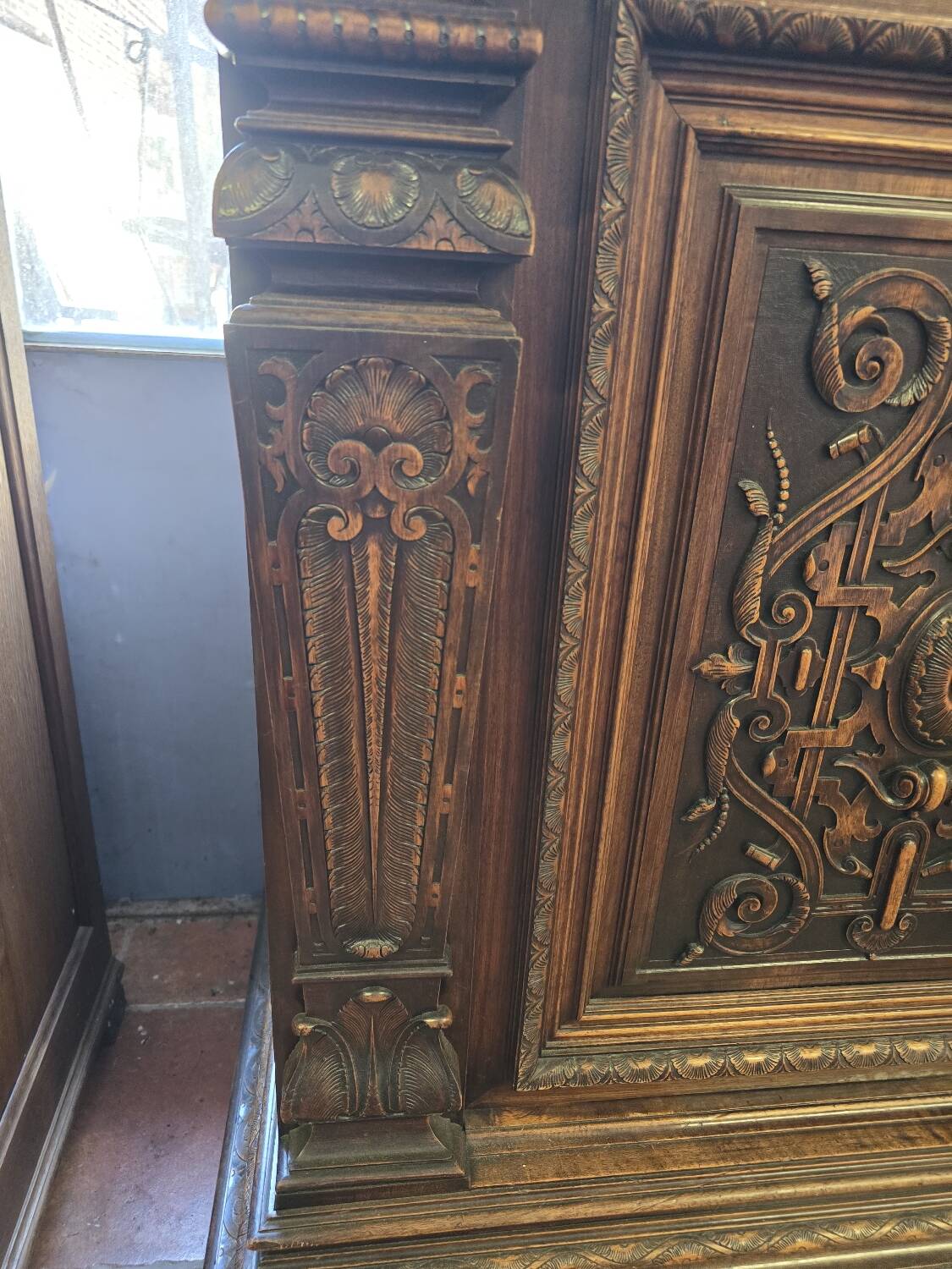 Renaissance style 2-door walnut sideboard