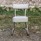 Set of 2 chairs and 1 armchair from the 70s in chrome metal and faux leather.