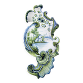 Wall-mounted bouquet holder in polychrome earthenware, with a wavy shape.