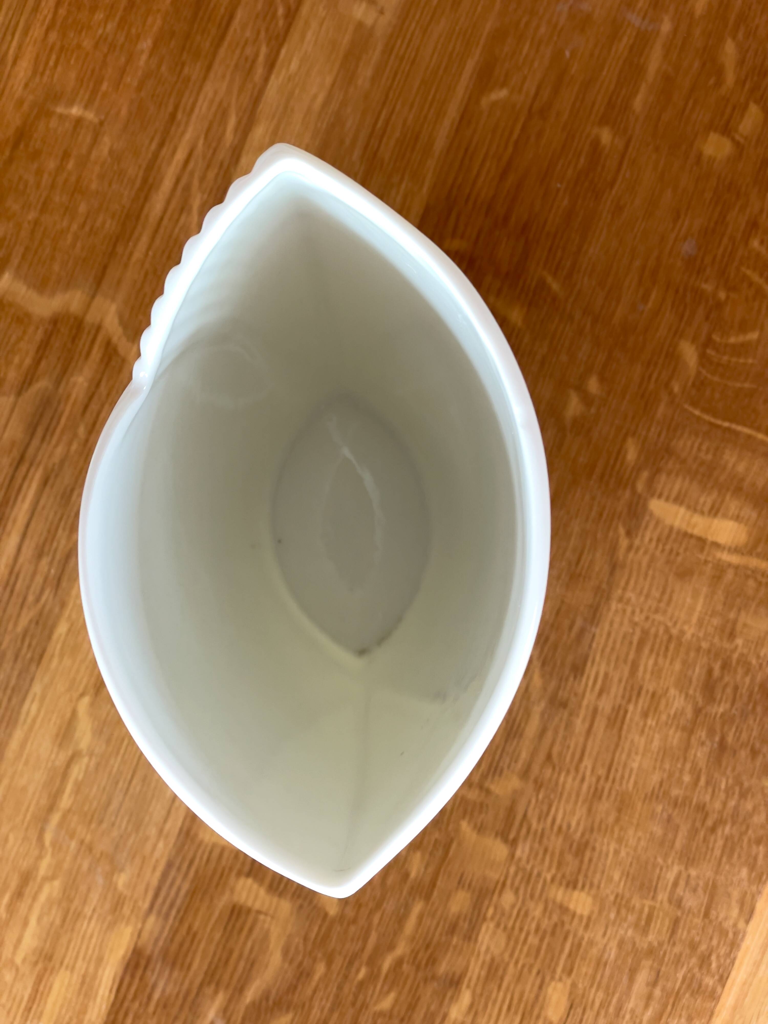 Vintage white porcelain vase AK Kaiser. It is signed Manfred Frey, 1960
