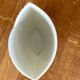 Vintage white porcelain vase AK Kaiser. It is signed Manfred Frey, 1960