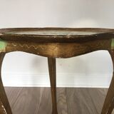 Old wooden tripod table in Venetian style