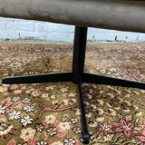 Swivel armchair in velvet fabric and metal