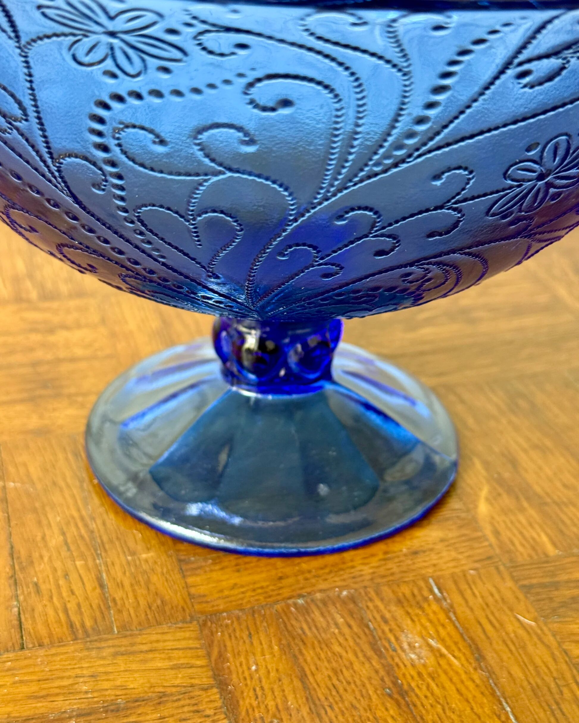 Bluish glass fruit bowl