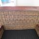 2 colonial-style armchairs in woven rattan and exotic wood