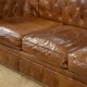 Brown leather Chesterfield sofa