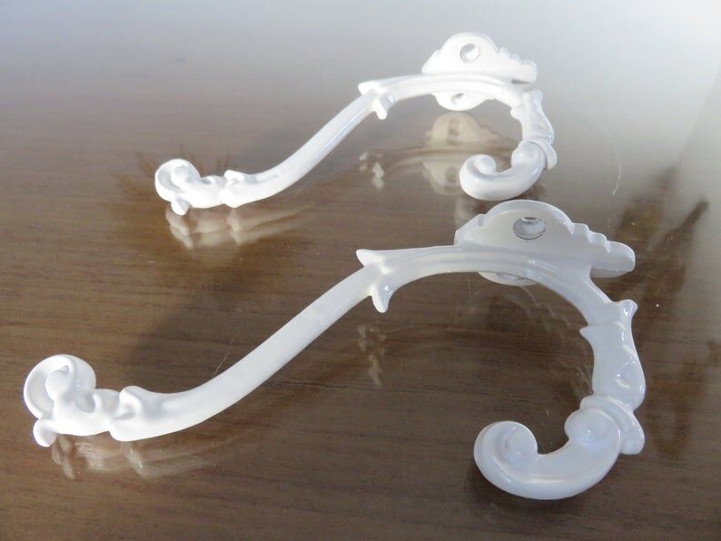 2 white cast iron pads art deco 30s 40s
