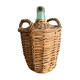 Demijohn surrounded by wicker