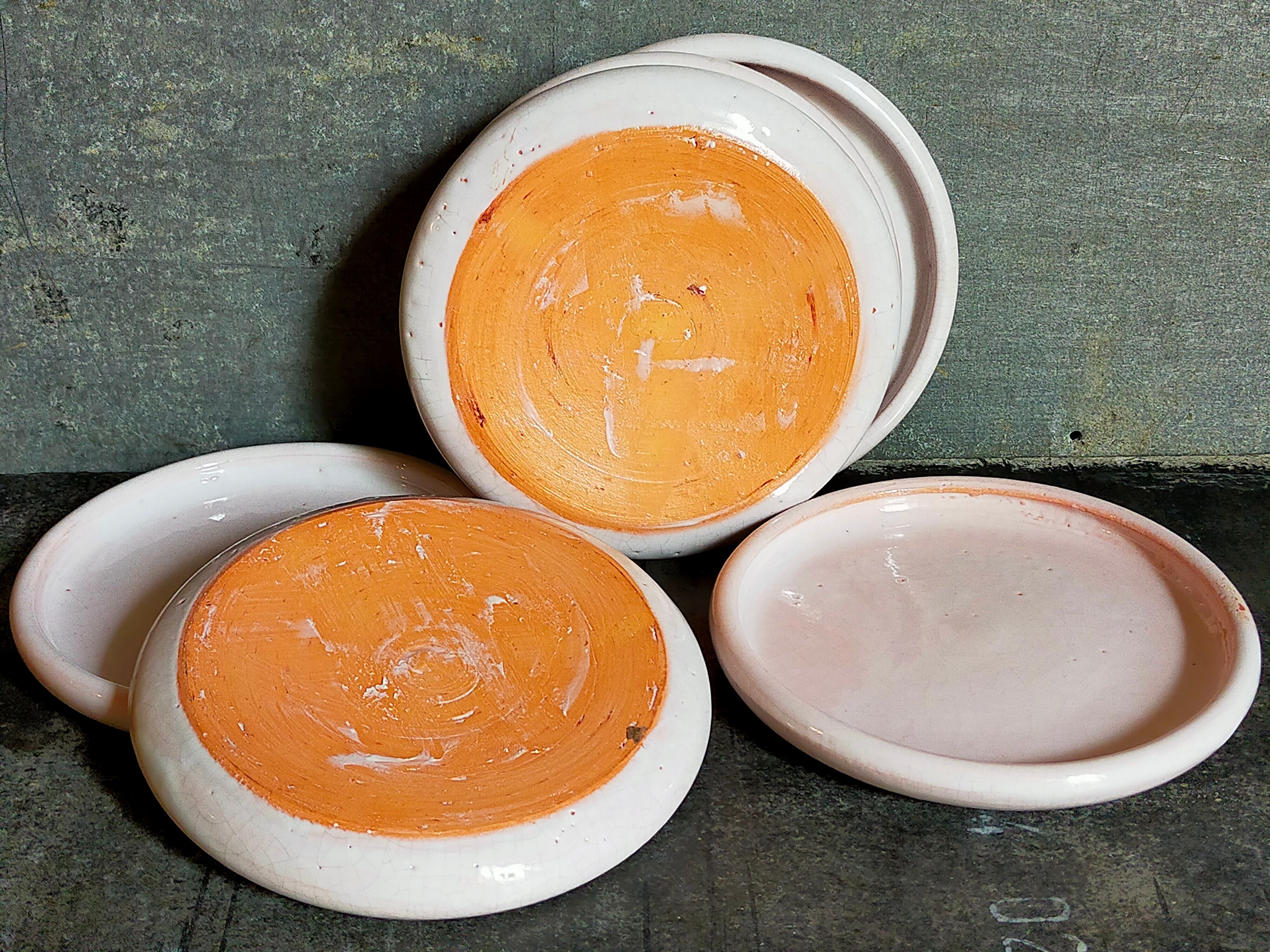 Six antique enamelled earth cut-cups