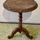 Carved wooden pedestal table