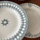 A deep plate in blue and green ironstone, antique French earthenware.