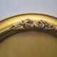 Old oval frame in wood and gilded stucco