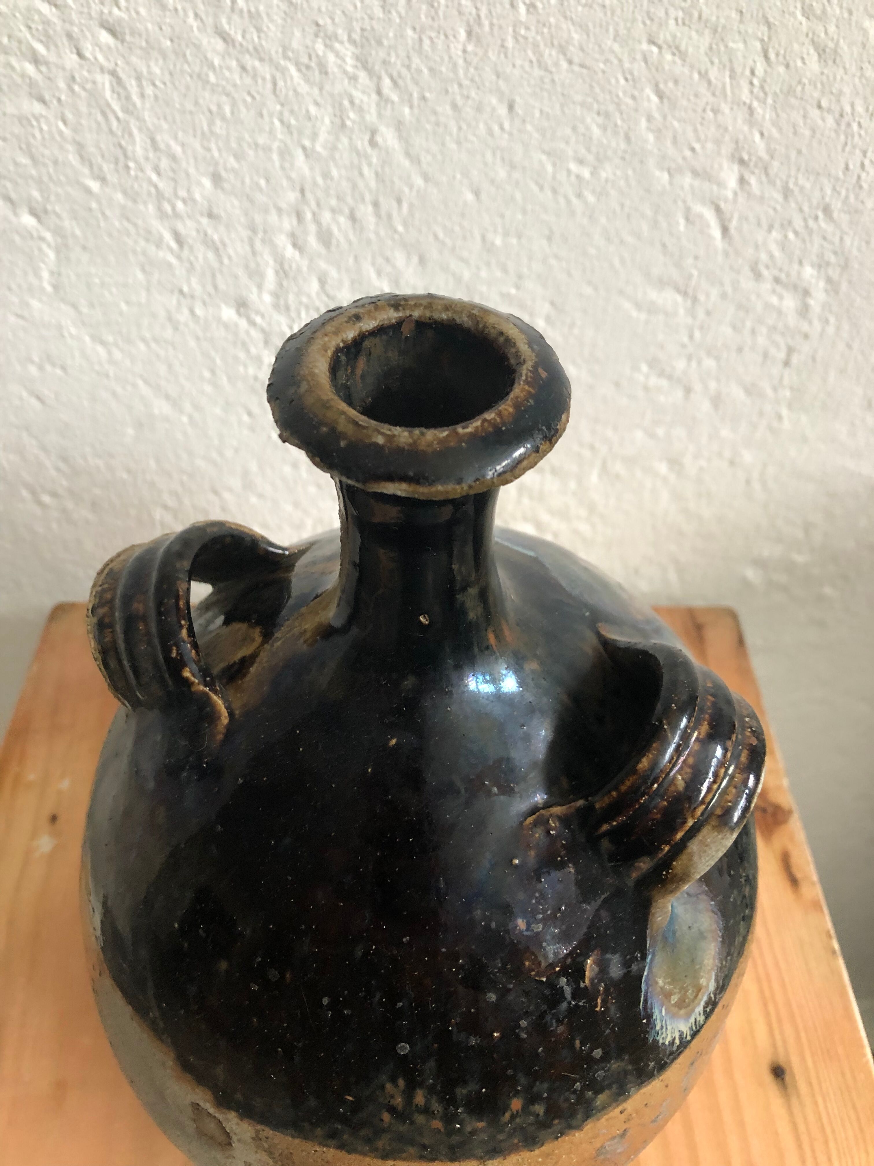 Old glazed terracotta jar