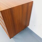 Vintage Scandinavian modernist chest of drawers in rosewood and black metal.