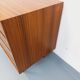 Vintage Scandinavian modernist chest of drawers in rosewood and black metal.