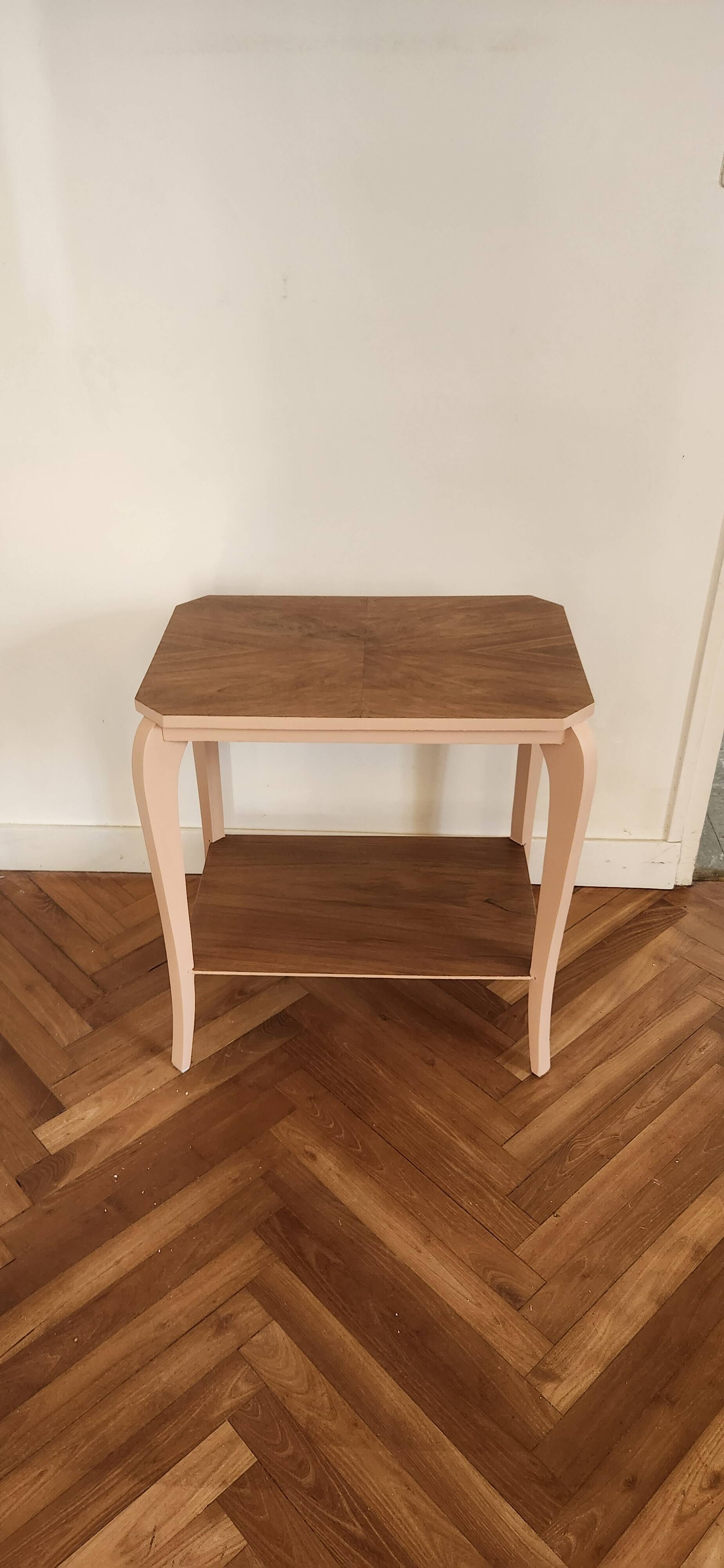 Side table with curved pink legs