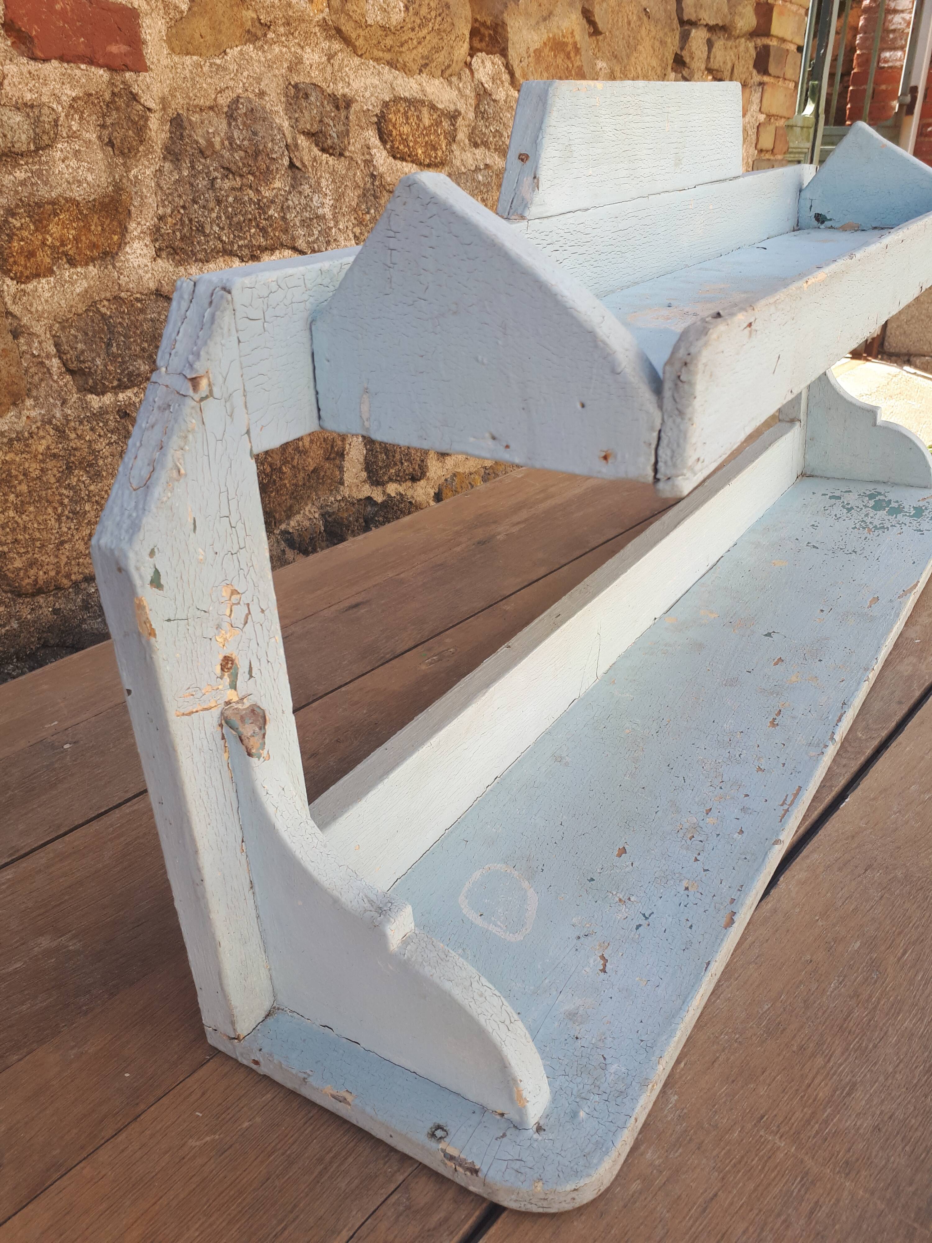 Blue wooden wall shelf