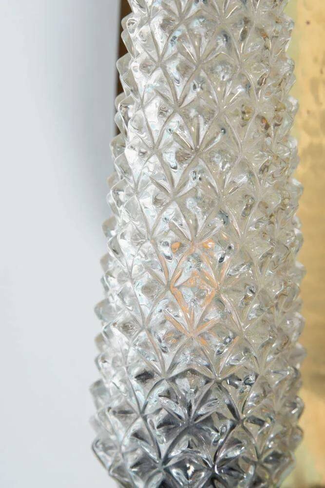 Vintage glass wall sconce from the 1960s in brass, mid-century light.