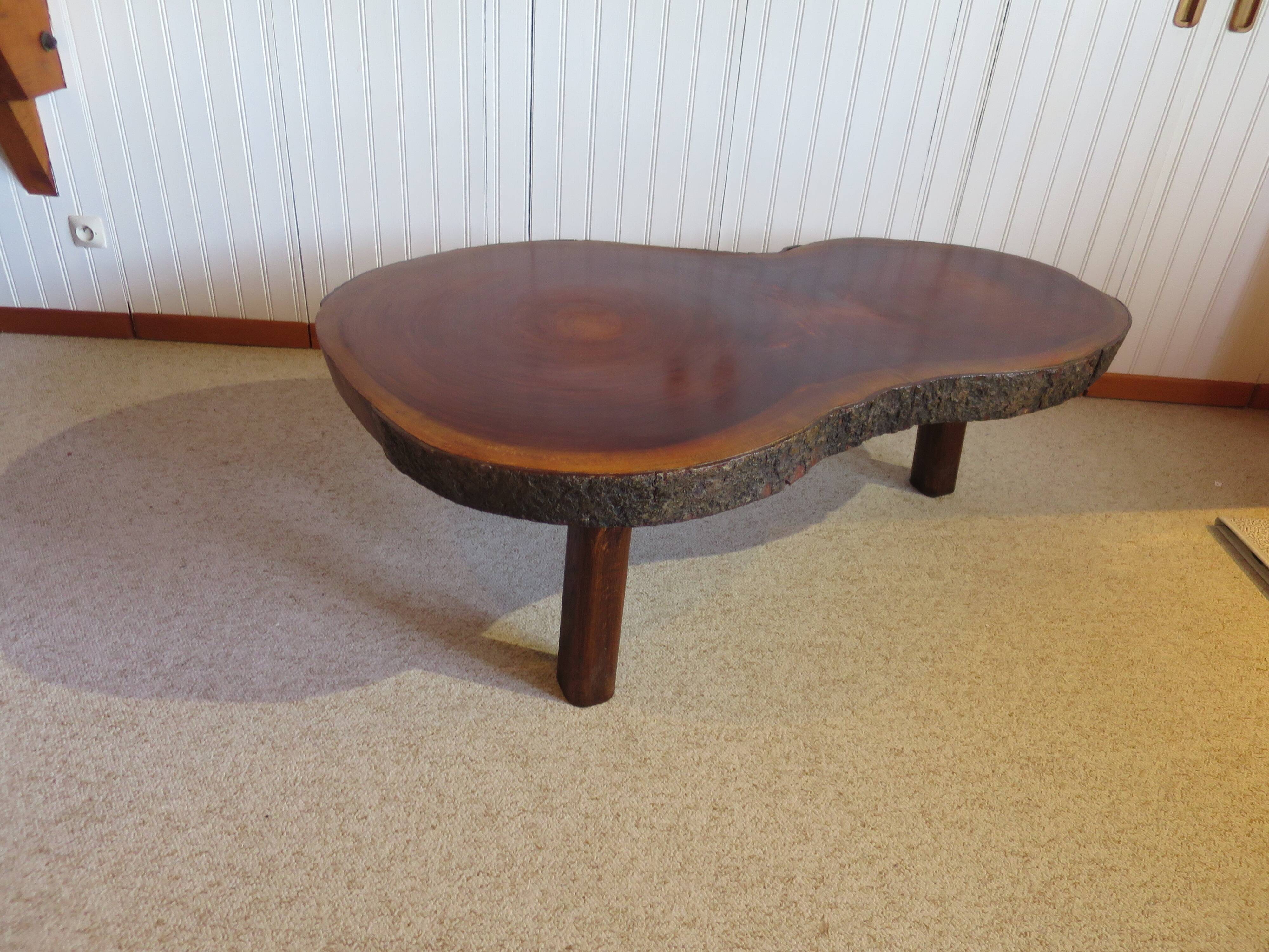 Tripod coffee table - solid okoumé wood - organic shape - brutalist style