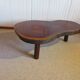 Tripod coffee table - solid okoumé wood - organic shape - brutalist style