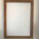 Cadre en bois doré sculpté 52x68,5 cm