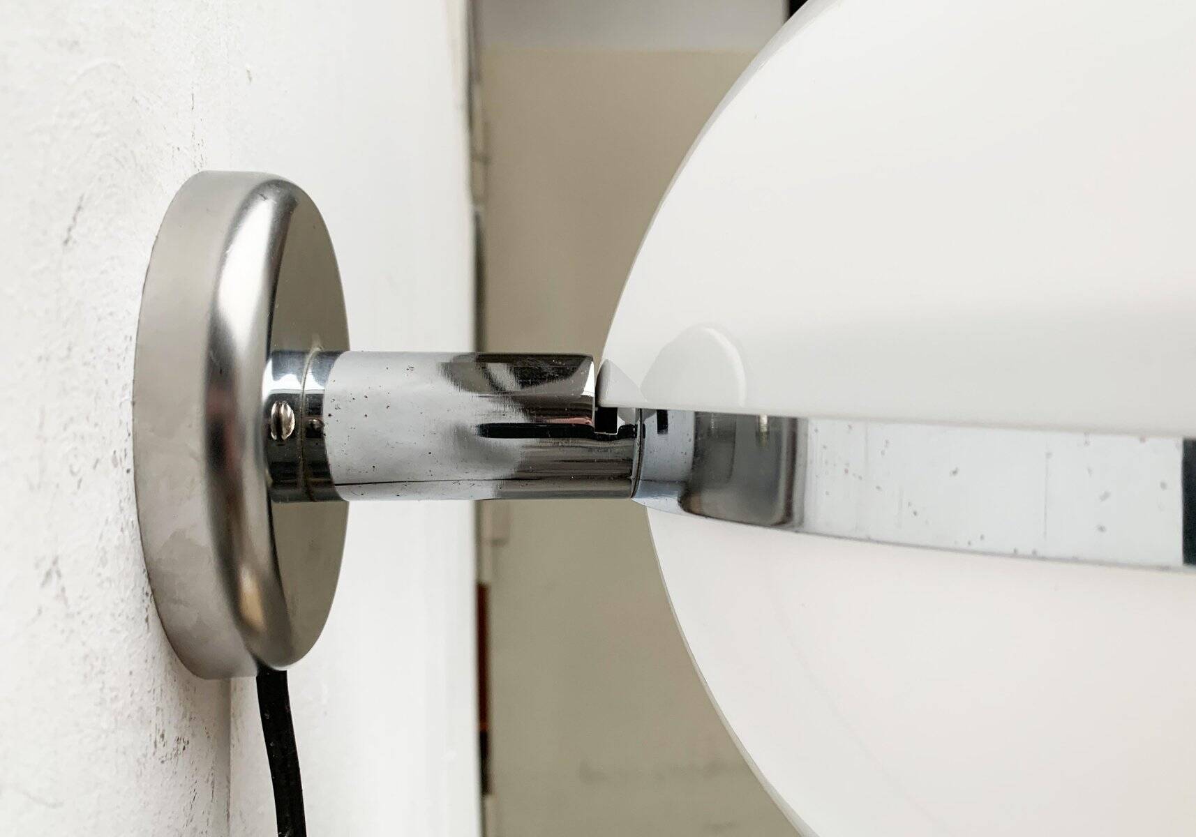 Mid-century Italian space age spherical wall light by Guzzini.