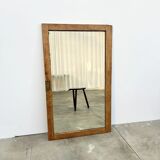 Antique mirror on an elm wardrobe door