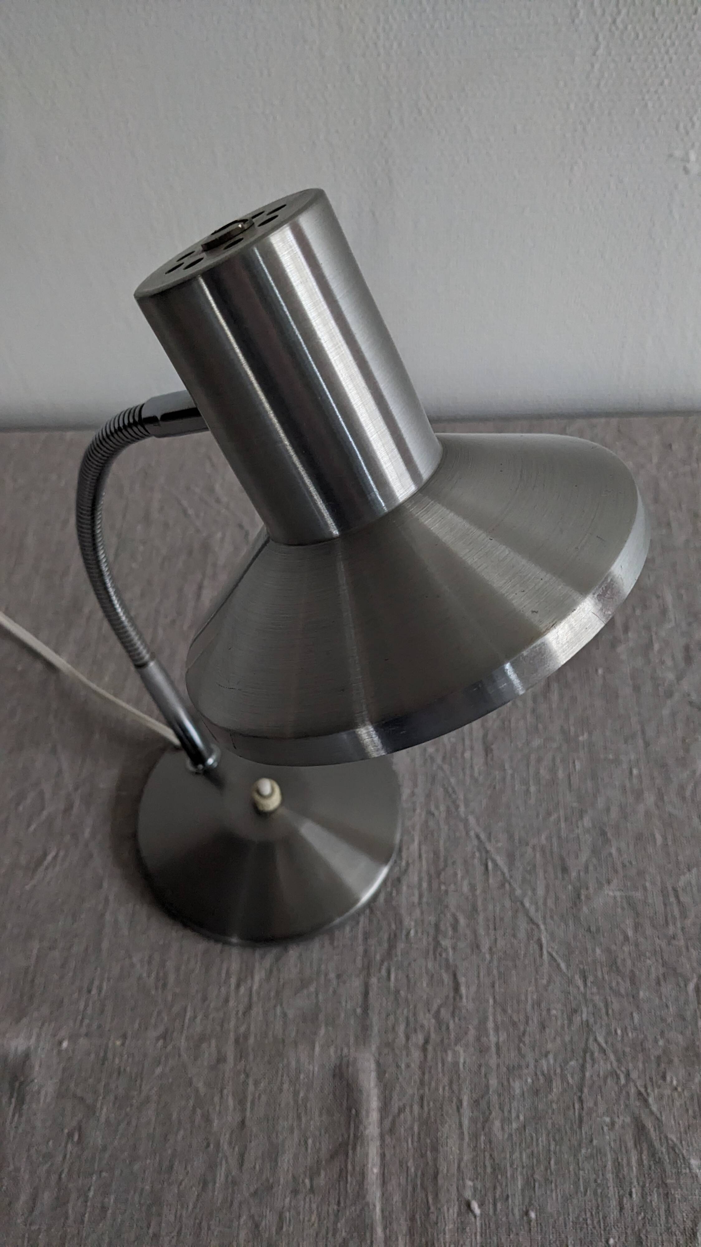 Articulated bedside lamp or wall light, France circa 1960.