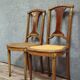 Pair of antique mahogany chairs with caning – Louis XVI style