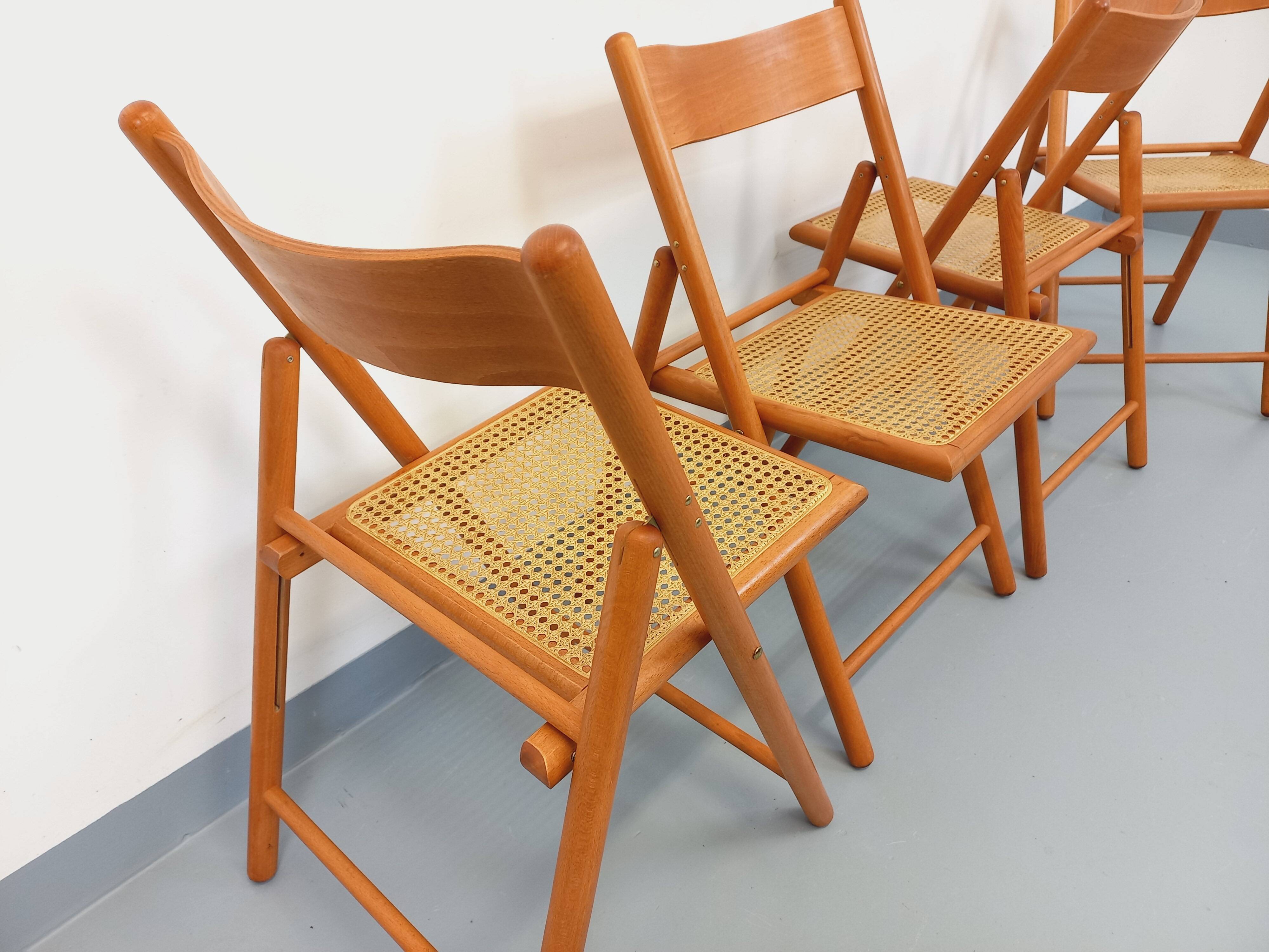 Set of 4 vintage folding chairs from Habitat made of beech wood and caning.