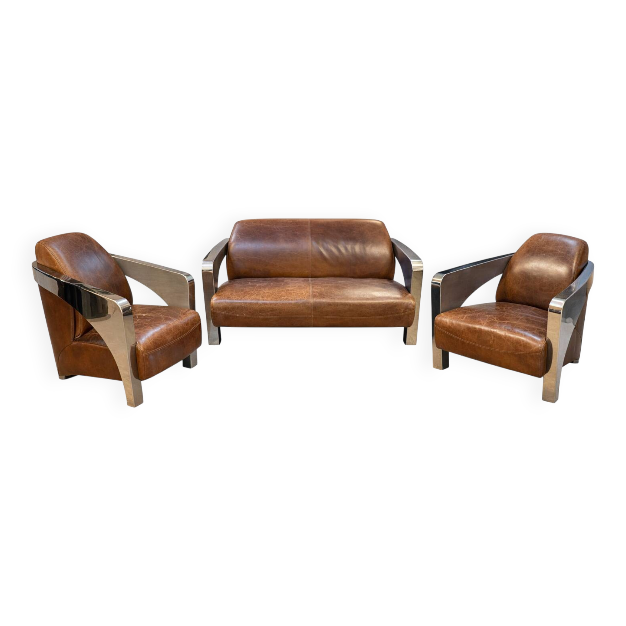 Set of 3 Stacyville items, leather and stainless steel, 2 armchairs and a sofa.