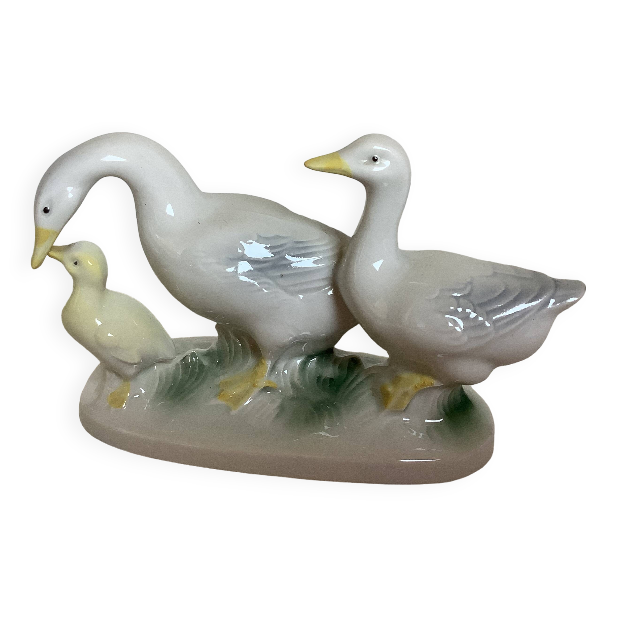 Trio of ceramic geese