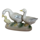 Trio of ceramic geese