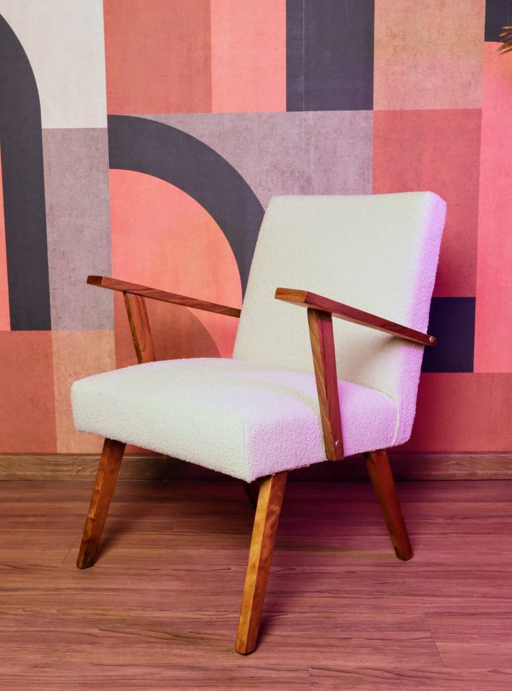 Vintage beige bouclé armchair with walnut wood from the 1950s.