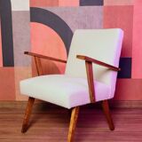 Vintage beige bouclé armchair with walnut wood from the 1950s.