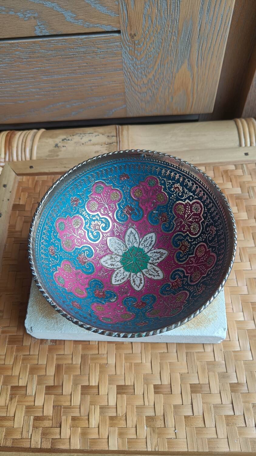 Brass footed bowl with coloured patterns