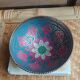 Brass footed bowl with coloured patterns