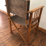 pair of Safari armchairs in wood and leather
