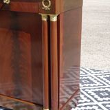 Flamed mahogany enfilade with sea green marble in Empire style.