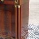 Flamed mahogany enfilade with sea green marble in Empire style.
