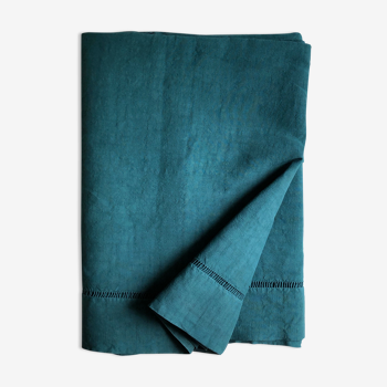 Old sheet in pure washed linen tinted in emerald green