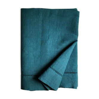 Old sheet in pure washed linen tinted in emerald green