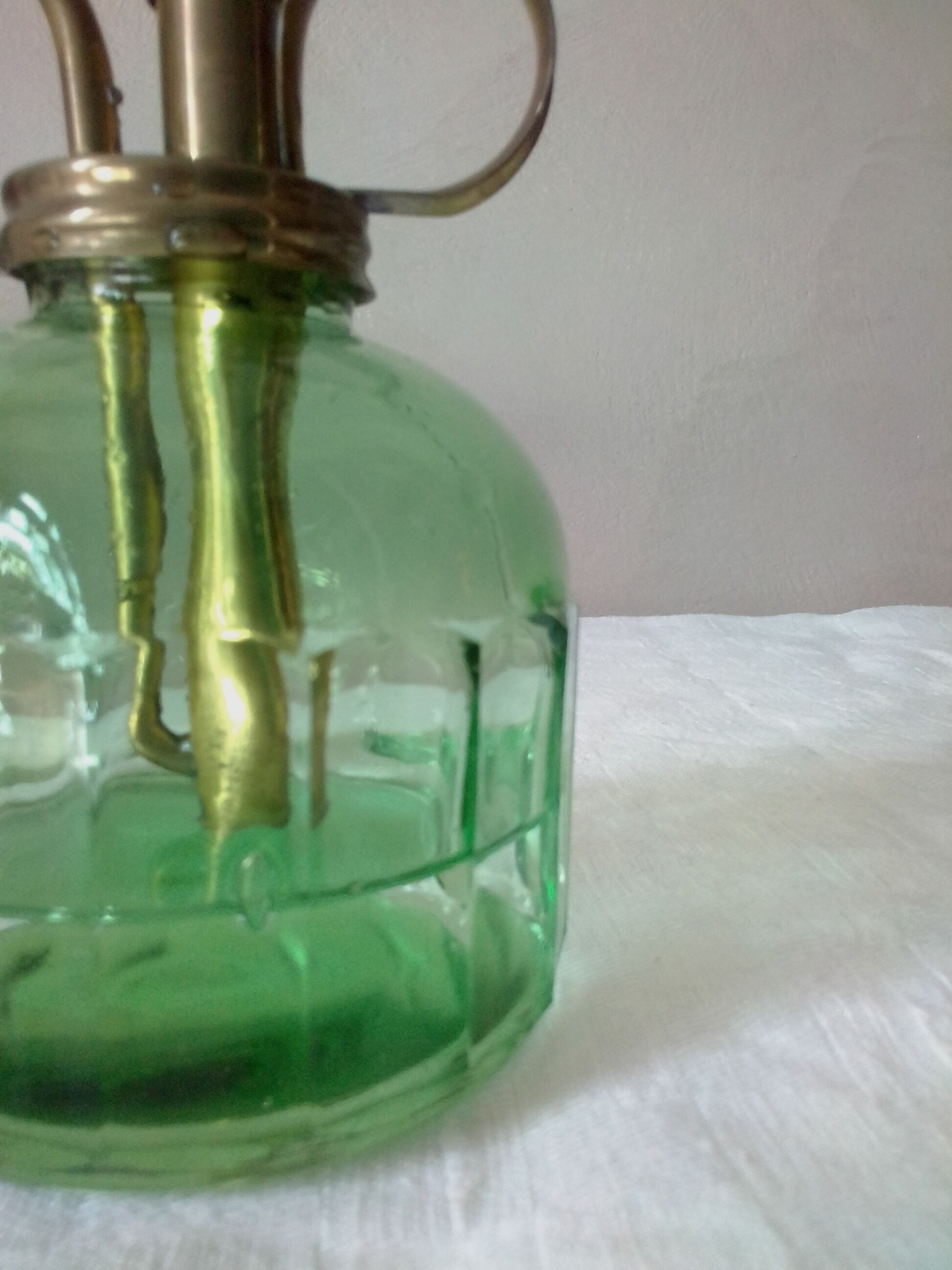 Spray for plants in brass and glass