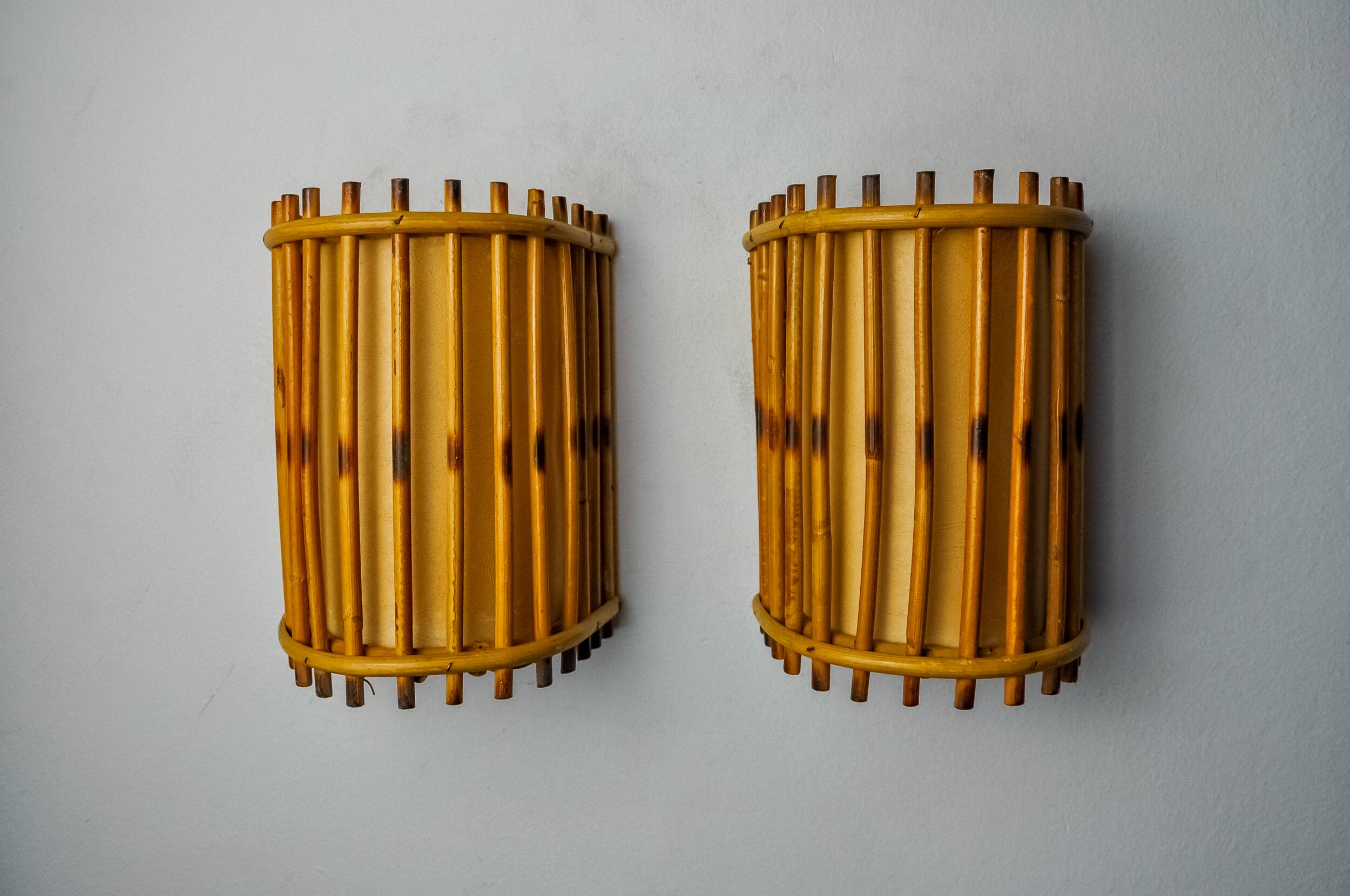 Pair of rattan wall lights, France, 1960
