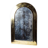 Large vintage Moroccan artisan wall mirror from the 50s-70s, made of solid brass, arch-shaped.