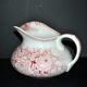 Pexonne earthenware vase/jug with a red floral rustic design