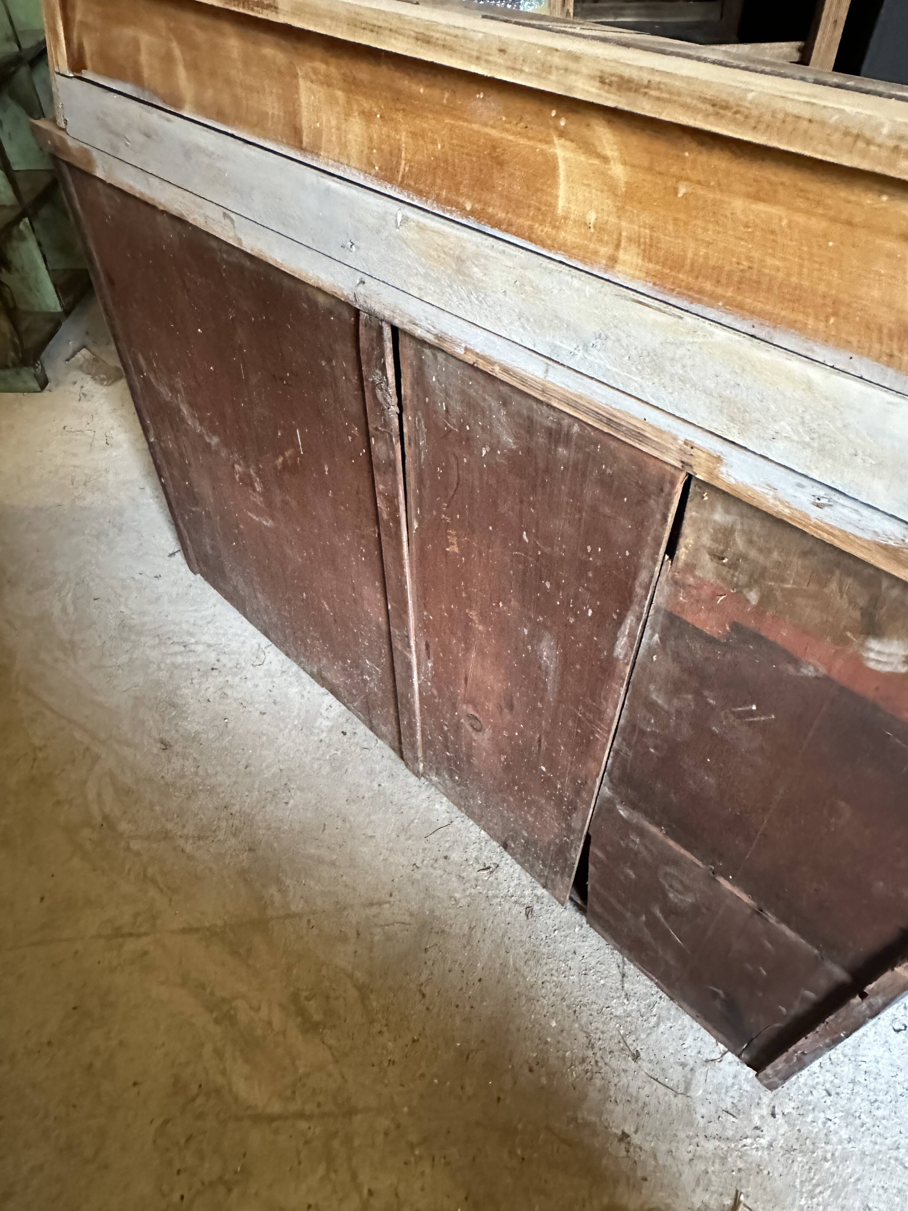 Showcase for boutique furniture, inclined boxes for presentation of collections on low sideboard