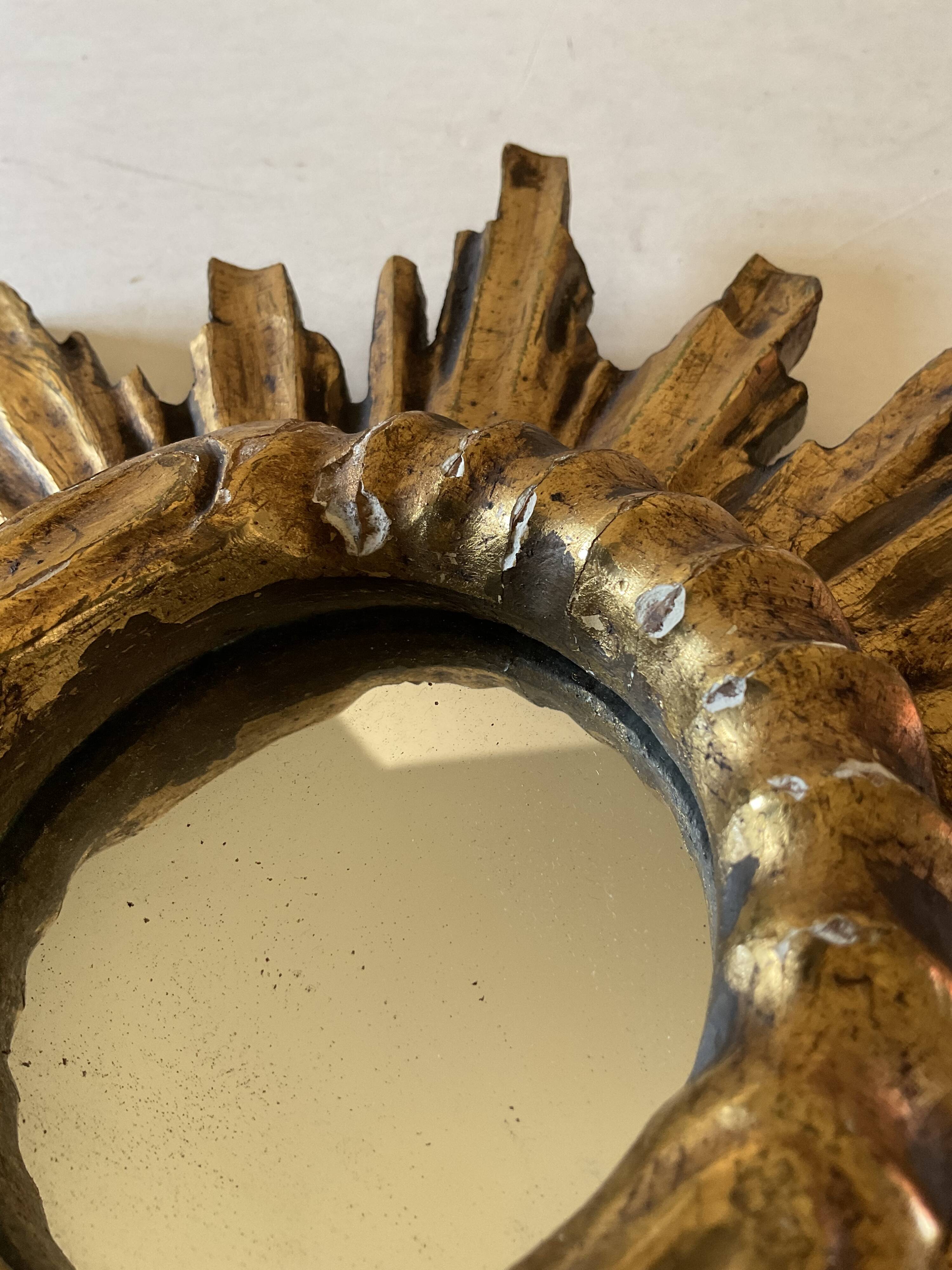 Miroir soleil vintage en bois doré