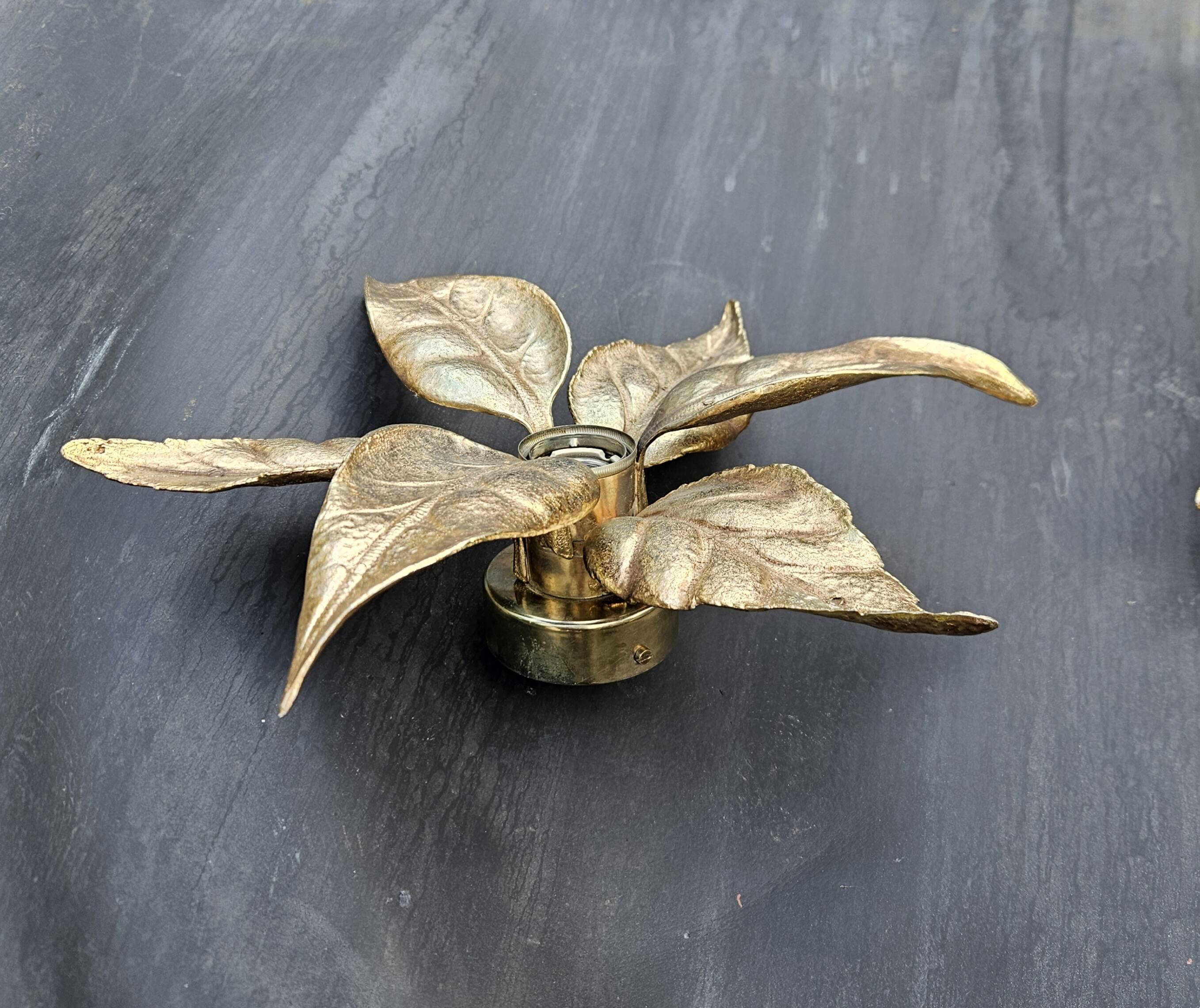 Pair of Massive wall lamps, designed by Willy Daro. 70s