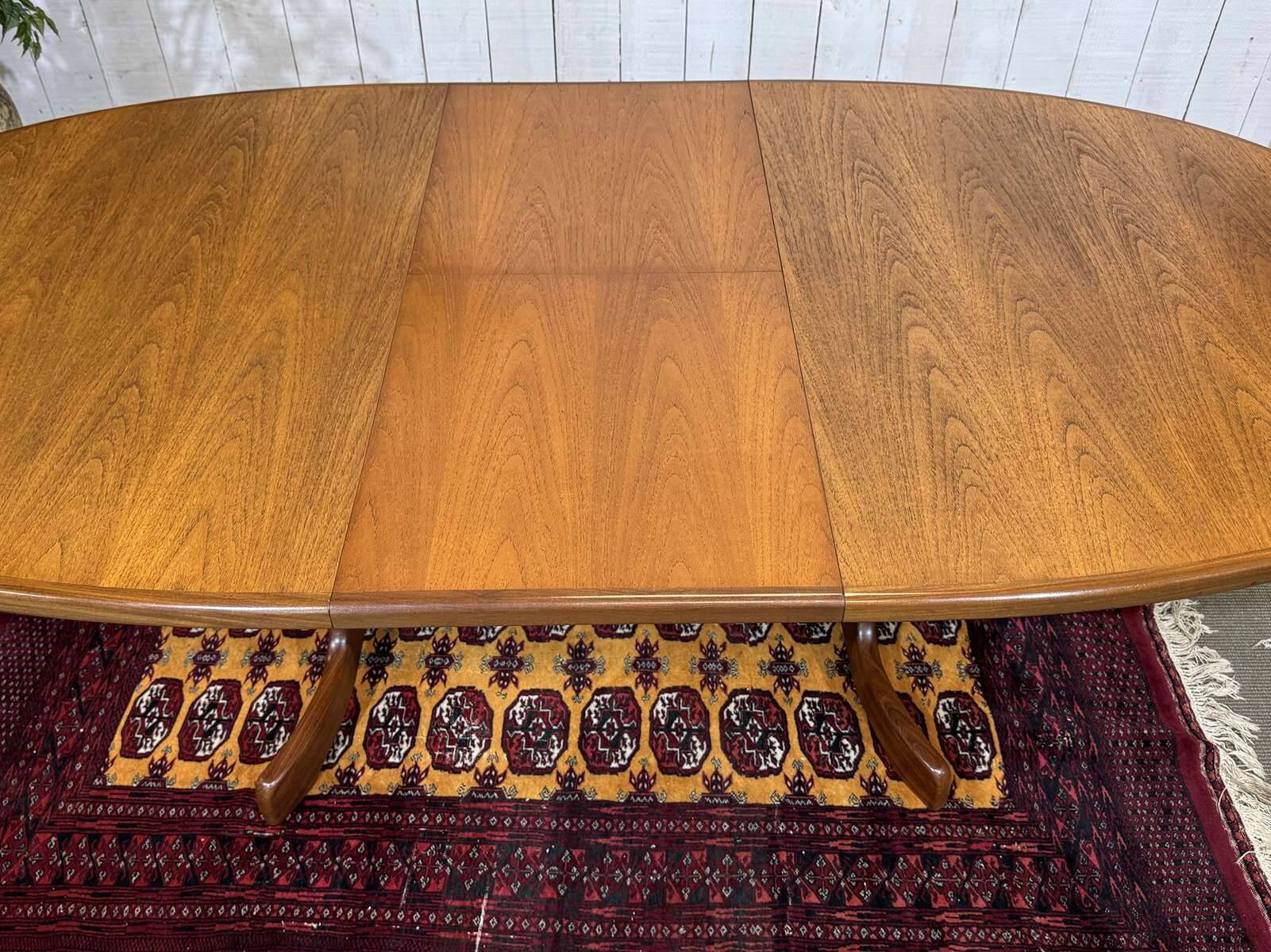 G-Plan oval teak table from the 1970s with a butterfly extension.